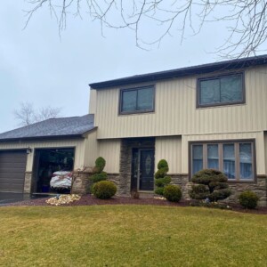 Board and Batten Siding in the color Savannah Wicker with White trim