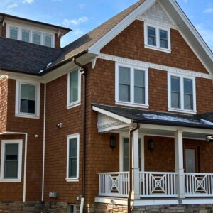 NuCedar Individual Shake with 5" exposure in the color Western Cedar with White trim