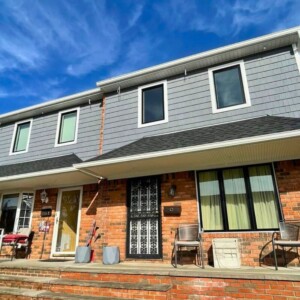 Vinyl Shake Siding in the color Oceanside with White trim