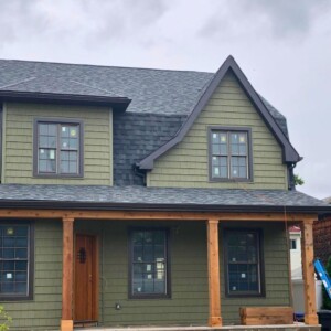 Vinyl Shake in the color Cypress with Black Tim