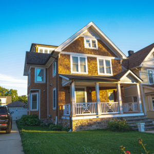 Horizontal Lap and Shingle Siding with Asphalt Shingle Roof