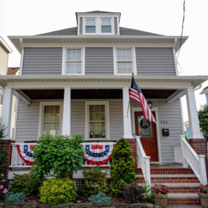 Certainteed Vinyl Shake and Siding in the Color Sterling Gray with White Window and Door Trim