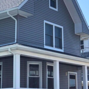 Vinyl Clapboard Siding in the color Graystone with White trim