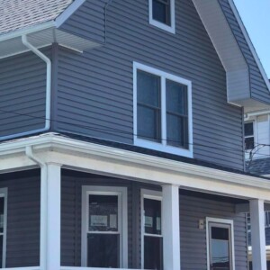 Vinyl Clapboard Siding in the color Graystone with White trim