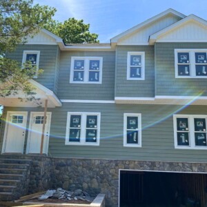 Vinyl Shake with Vinyl Fully Insulated Clapboard Siding in Cypress with White Board & Batten on Gables with White Trim