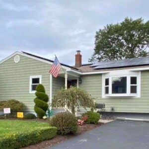 Vinyl Shake Siding in the color Cypress with White Trim
