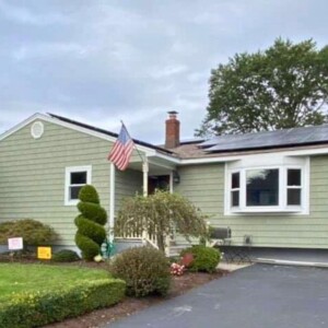 Vinyl Shake Siding in the color Cypress with White Trim