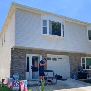 Vinyl Shake Siding in the color Natural Linen with white Trim