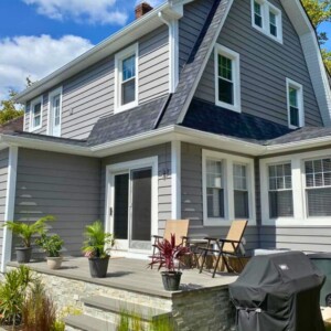 Vinyl Clapboard Siding in the color Graystone with White trim