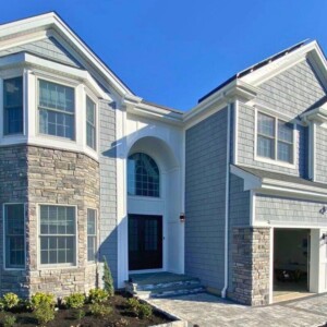 Vinyl shake and Vinyl Dutchlap Siding in the Color Nantucket with white Trim