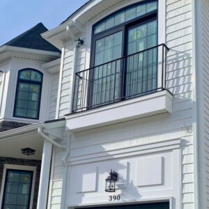 Vinyl Shake and Vinyl Clapboard Siding in the color White with PVC Trim