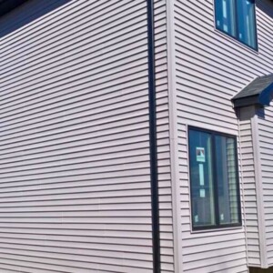 Vinyl Clapboard Siding in the color Granite Gray with Musket Brown Trim