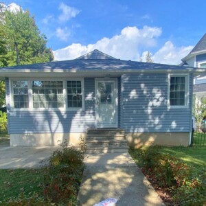 Vinyl Dutchlap Siding in the color Nantucket with White trim
