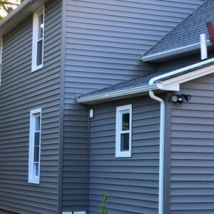 Vinyl Siding in the color Charcoal Gray with White trim