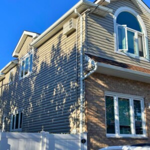 Vinyl Dutchlap Siding in the color Rye with White Trim