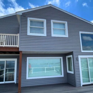 Vinyl Dutchlap Siding in the color Greystone with White Trim